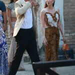 Tom Brady chatted away to one of billionaire Rupert Murdoch's glamorous ex-wives during Jeff Bezos and Lauren Sanchez's wedding festivities this week