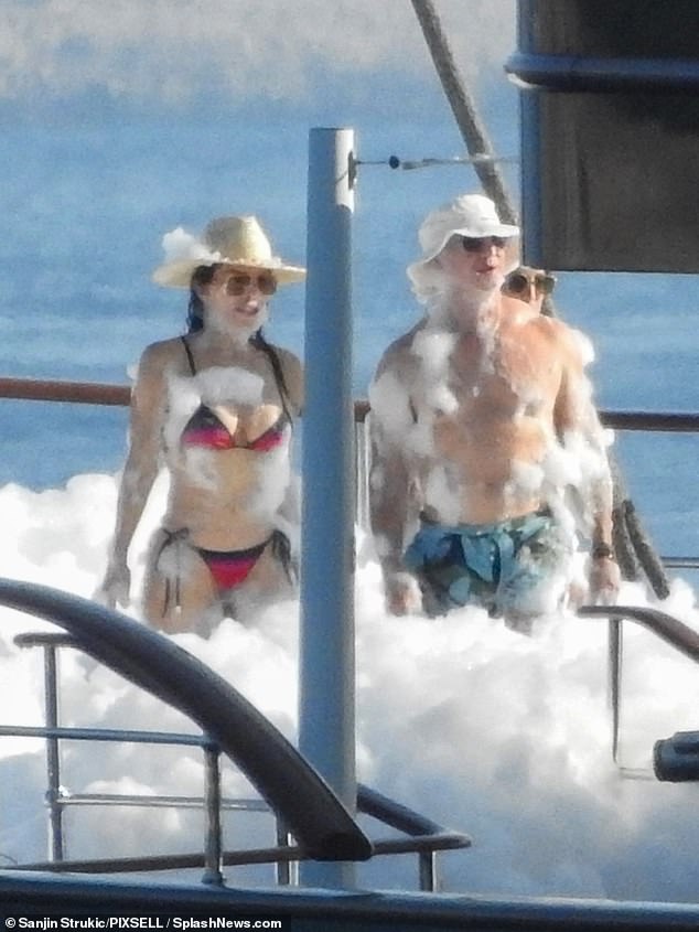 Jeff Bezos, 61, and Lauren Sanchez, 55, at a foam party on board his $500million superyacht Koru