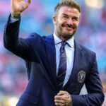 Sir David Beckham was seen beaming after finally getting his knighthood as he headed to Miami for the FIFA Club World Cup on Saturday
