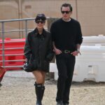 Lily Allen couldn't stop smiling as she stepped out with stylist Marco Capaldo at Glastonbury on Saturday morning