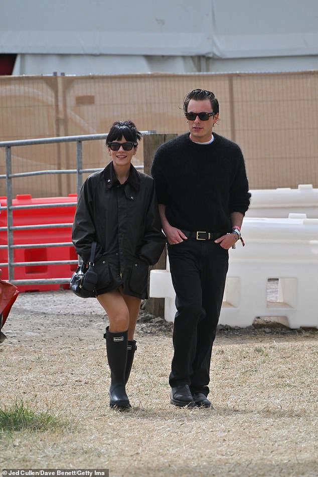 Lily Allen couldn't stop smiling as she stepped out with stylist Marco Capaldo at Glastonbury on Saturday morning