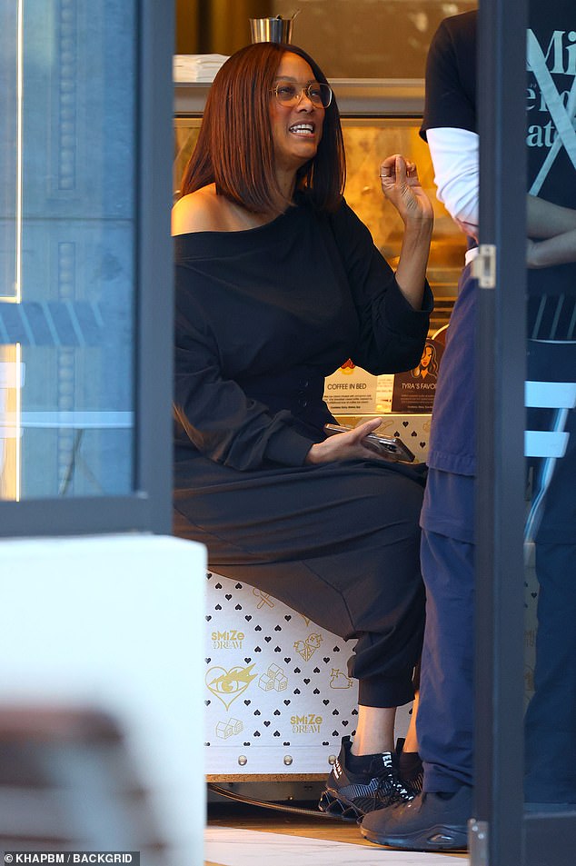 Tyra, who has been living in Australia for nearly two years, could be seen wearing an all black ensemble for the ice cream outing