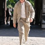 Will Poulter cut a stylish figure in a beige striped co-ord as he arrived at the 424 men's show in Paris during fashion week on Tuesday