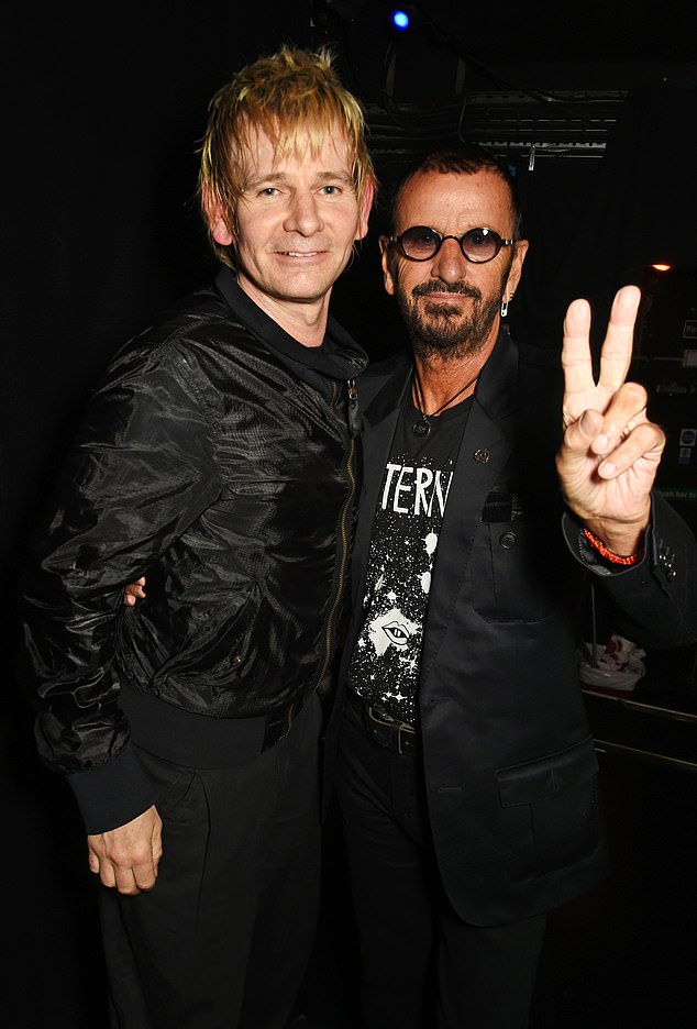 Growing up as the son of Beatles legend Ringo Starr, 84, wasn't the easiest for drummer Zak Starkey, 59 (pictured together in 2016)