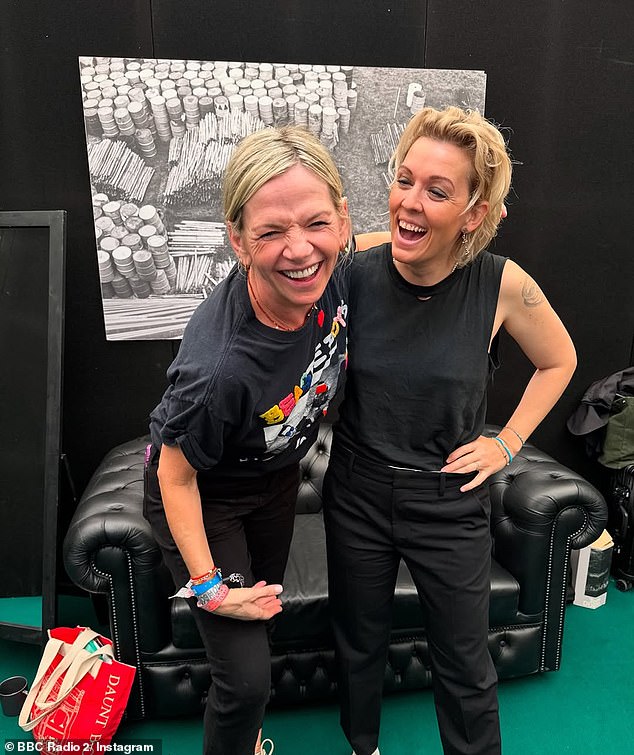 Presenter Zoe Ball (left) made her big BBC Radio 2 return live at Glastonbury this weekend after she was spotted looking 'blissfully happy' with a mystery man (pictured with singer Brandi Carlile)