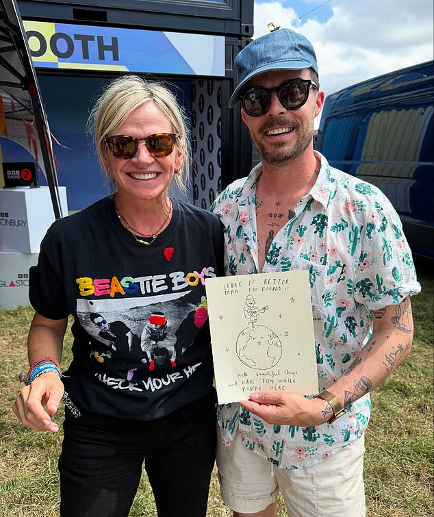 The radio presenter pictured with Australian artist Oliver Jeffers backstage at Glastonbury Festival at Worthy Farm