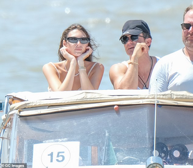 Bloom was also recently spotted cozying up to Leonardo DiCaprio's girlfriend, Vittoria Ceretti, during a water taxi ride as they headed to the airport following the Amazon founder's wedding this past weekend (seen above)