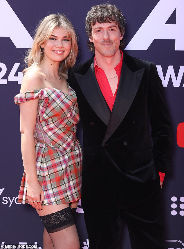 News of Monique's divorce party comes after her former husband Tim went public with his much younger girlfriend Lizzie Baxter in November. They went red carpet official at the 2024 ARIA Awards (pictured)