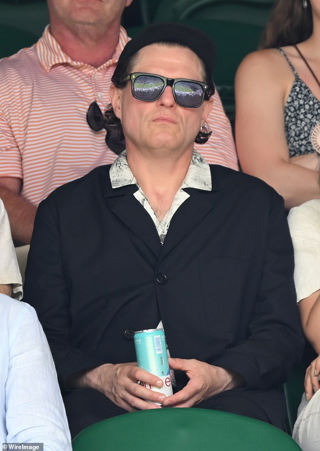 For the tennis day out he looked dapper in a dark suit and white shirt, while Celina looked chic in a beige linen dress