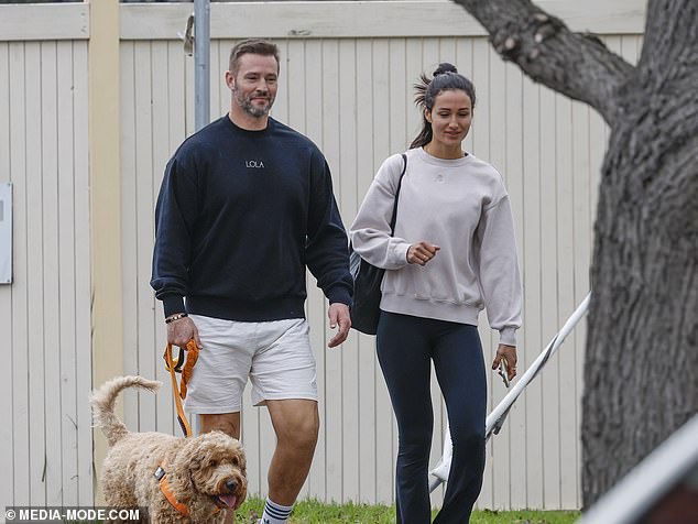 The couple, who have been married for nearly three years, were enjoying some quality time in Melbourne with their faithful pooch