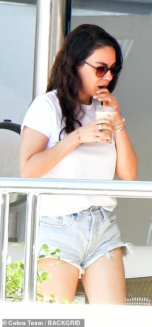 The Family Guy actress looked leggy in a classic white T-shirt French-tucked into Daisy Duke cut-off shorts