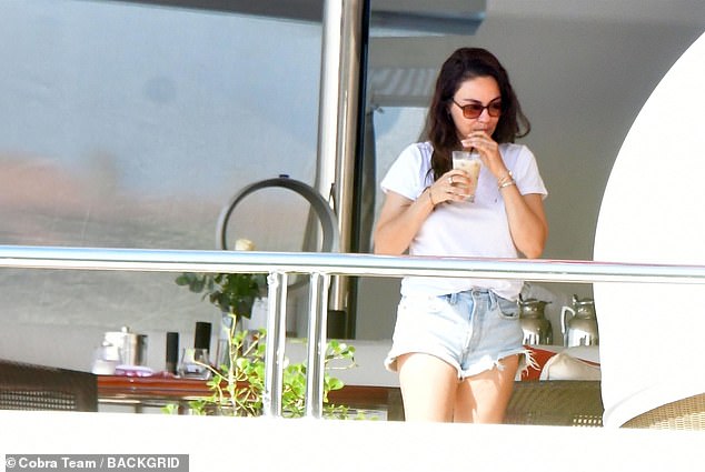 Mila (born Milena) also wore dark sunglasses as sipped on an icy beverage while taking in the Venetian view