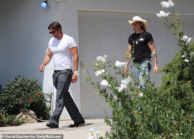 The grieving teen was later spotted with older brother Christian