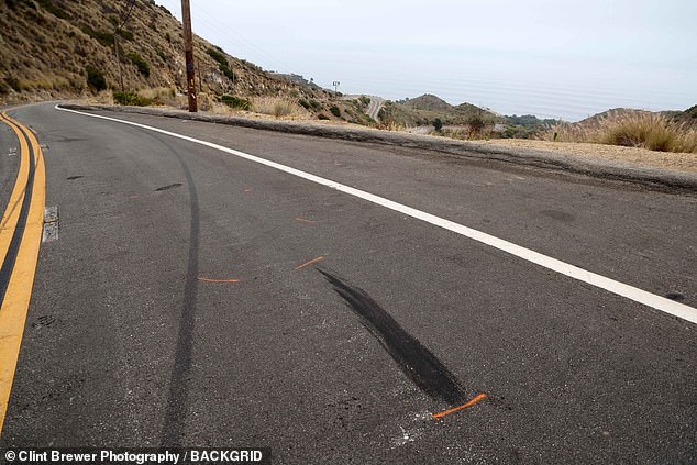 The site of the fatal accident with skid marks visible is pictured