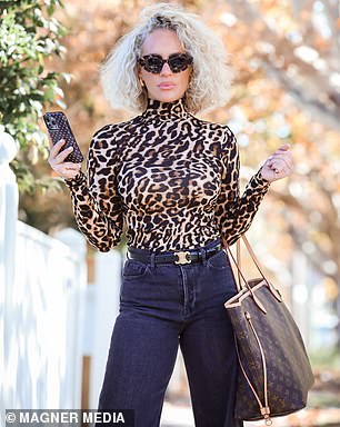 She looked stylish in an array of designer outfits while doing household chores