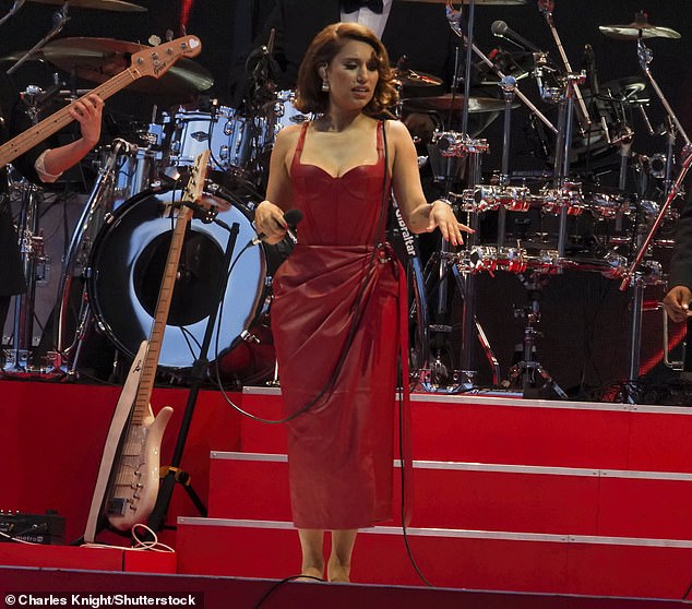 Raye was sure to catch the eye in her racy red leather ensemble as she took to the stage at Silverstone