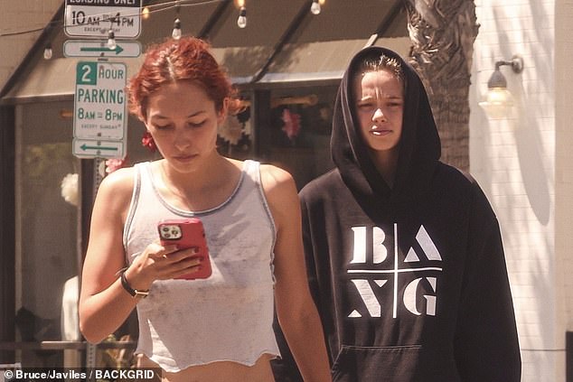Keoni checked for any updates on her phone