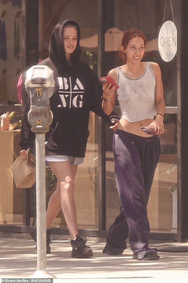 The duo emerged from the bakery victorious, bag of goodies in Shiloh's hand