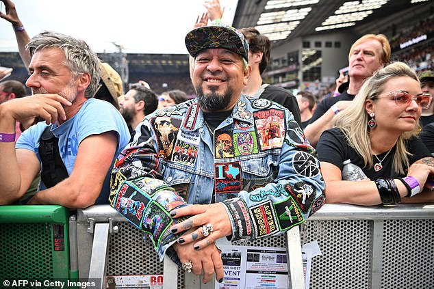 Fans looked delighted as they eagerly waited up front for their chance to watch Black Sabbath one last time