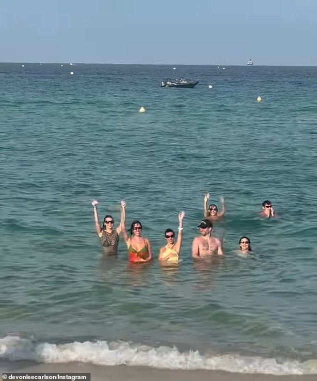 The Wildflower Cases founder also shared a photo of Kendall and Kylie alongside their friends after they enjoyed an impromptu swim after doing shots at the day club