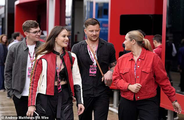 The pair were accompanied by friends while entering the venue ahead of the race