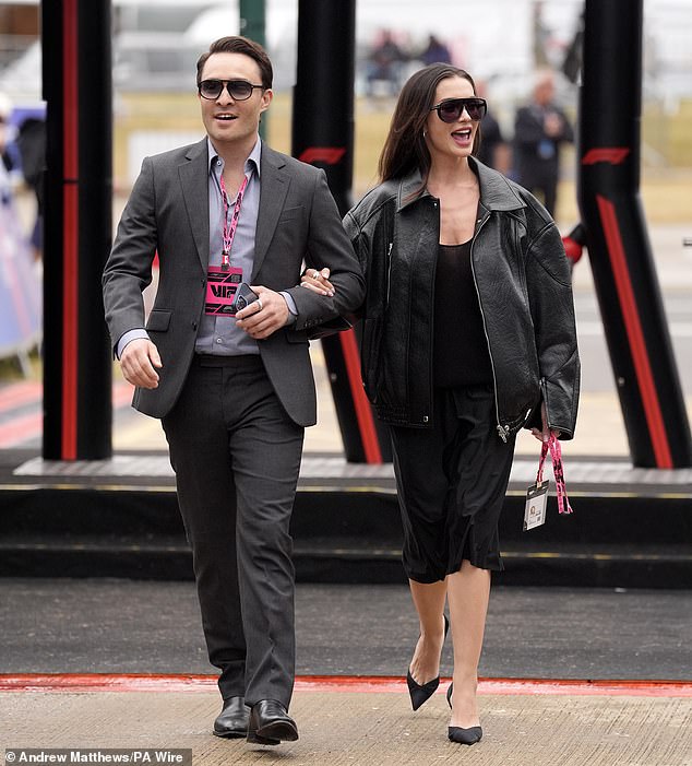 Ed Westwick looked smart in a slim-fitting grey suit while walking arm-in-arm with actress wife Amy Jackson on Sunday