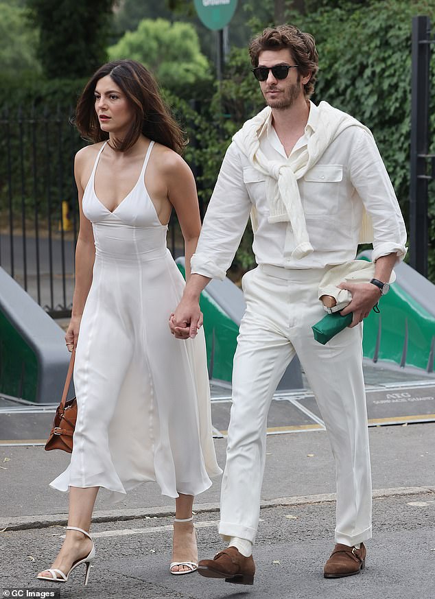The Spiderman star, 41, and American actress, 35, matched in tennis whites and arrived at the tournament hand-in-hand before packing on the PDA in the stands