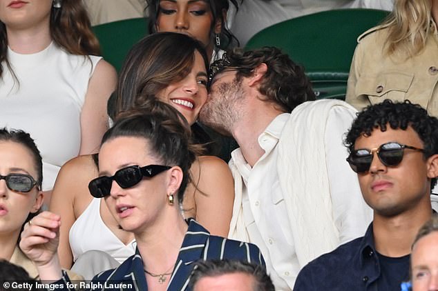 The actress who is known for her role in Top Gun: Maverick could not keep the smile off her face