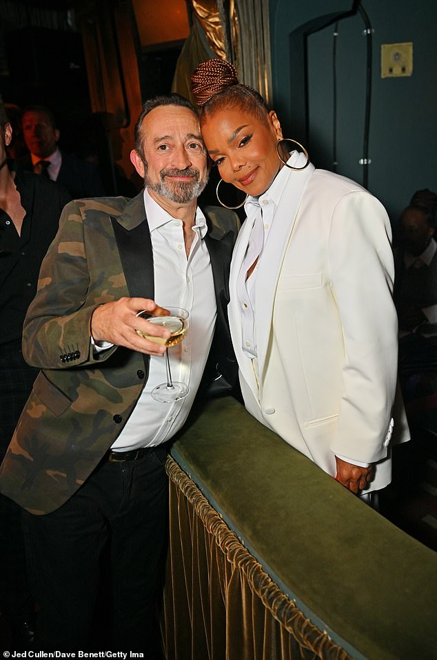 Janet beamed as she posed for snaps alongside Cabaret's star Fenton Gray