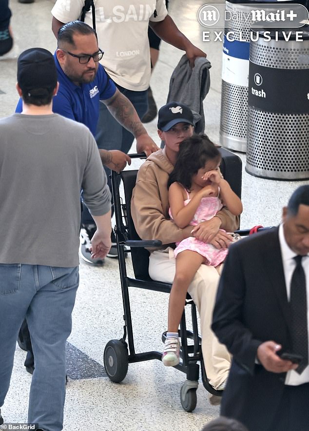 Mellencamp looked frail and used a wheelchair on their busy travel day
