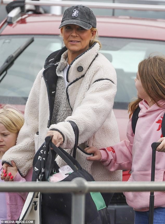 The former star of The Project jetted out of Perth Airport with her girls, Evie, eight, and Adelaide, six, who she shares with ex-partner Chris Walker