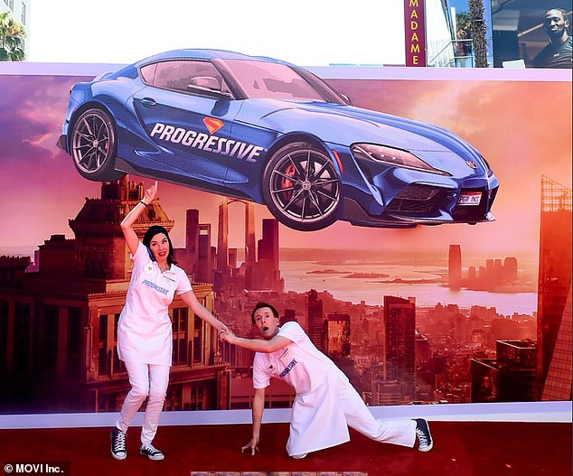 Progressive’s Flo and Jamie prove that not all heroes wear capes as they stop for a photo on the red carpet at the Superman premiere