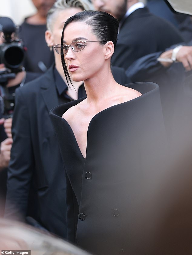 Perry mingled with guests outside the venue ahead of Wednesday's fashion show in Paris