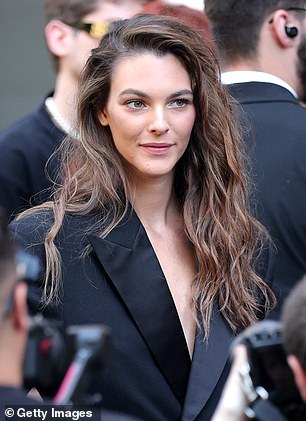 The look was offset with minimal makeup and a notable lack of accessories
