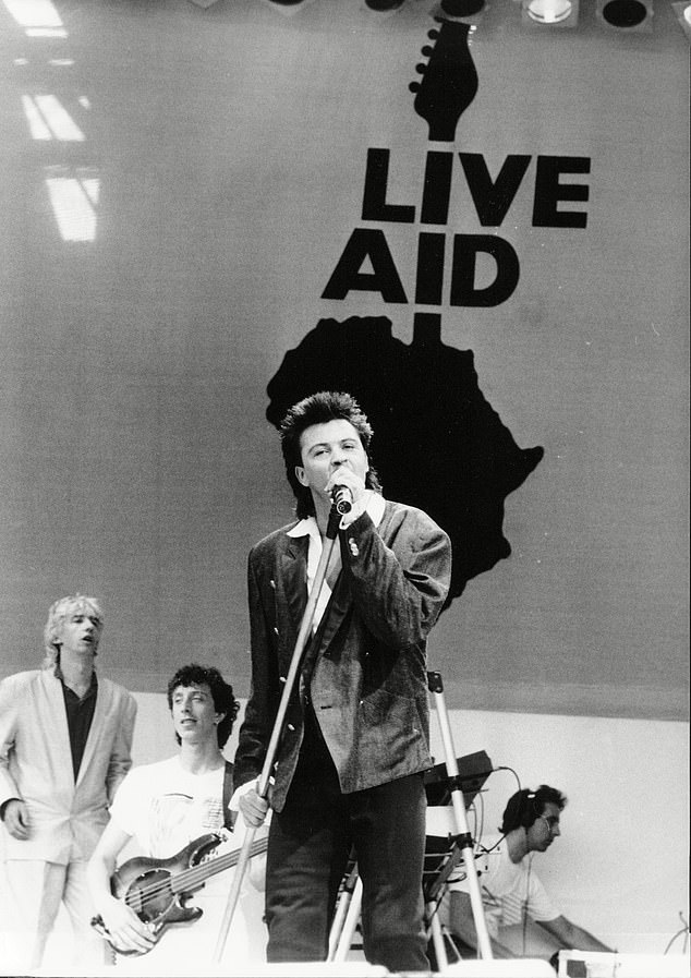 When Paul Young signed up for Live Aid, he was riding high as a solo artist - having recently split from the band, the Q-Tips (seen on stage at the concert)