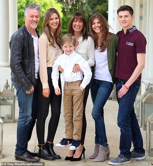 Paul and ex-wife Stacey with their daughters Levi and Layla and sons Grady and Jude in 2016
