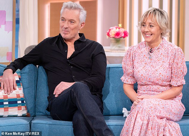 Pictured: Martin Kemp with wife Shirlie Holliman on This Morning in February 2020. Although doctors were concerned the second tumour was growing, Shirlie was worried about the dangers of undergoing surgery in the 1990s