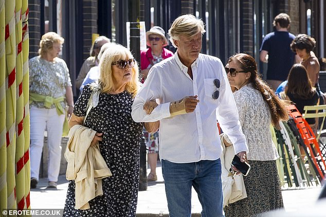 Judy donned a pair of dark shades while out and about