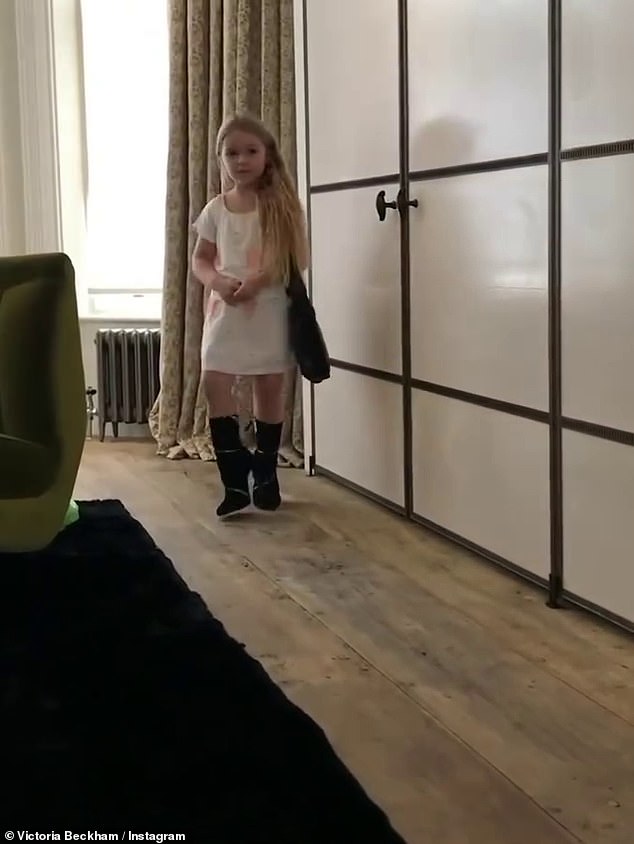 Another clip Victoria shared saw the youngster modelling  a white dress and a pair of boots