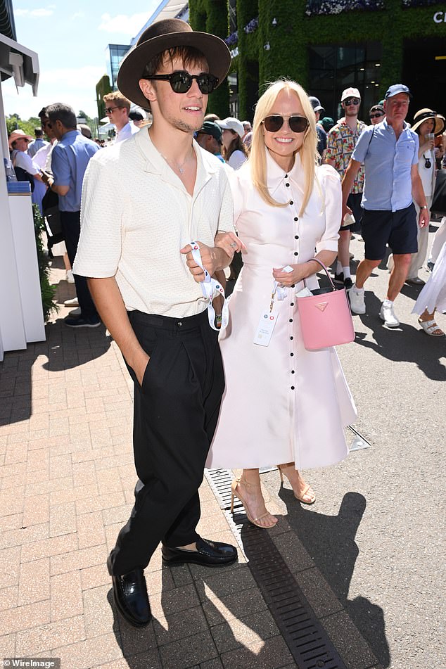 Spice Girl Emma Bunton, 49, arrived in a glamorous white dress alongside her dapper son Beau, 17, who sported an off-white polo