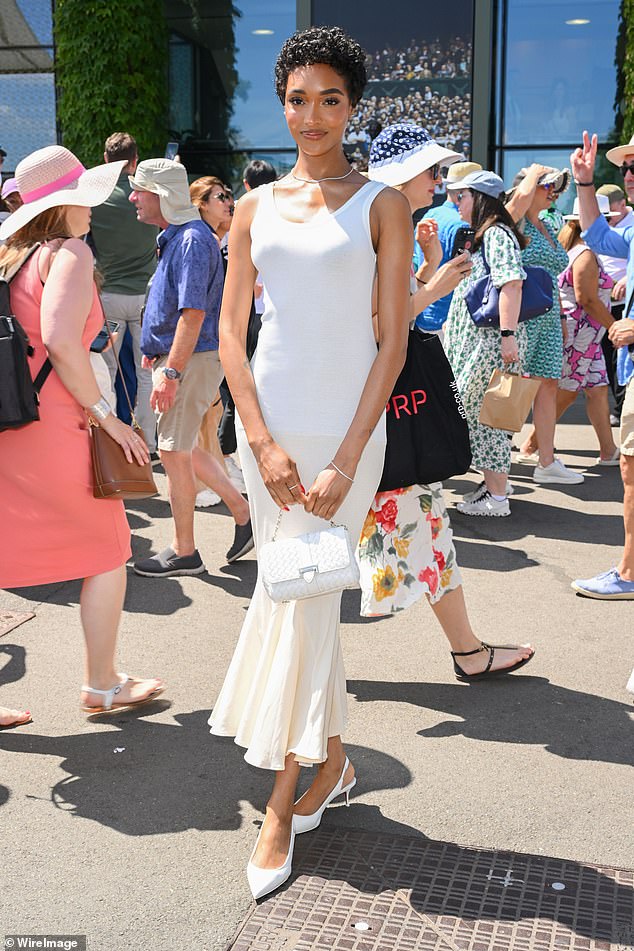 Jourdan Dunn pulled out all of the stops in a figure-hugging gown, adorned with matching white accessories