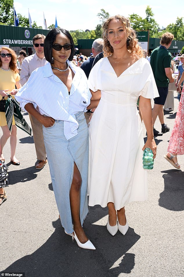 Leona posed for a picture with Keisha Buchanan, who looked incredibly glamorous in a thigh-high split denim skirt