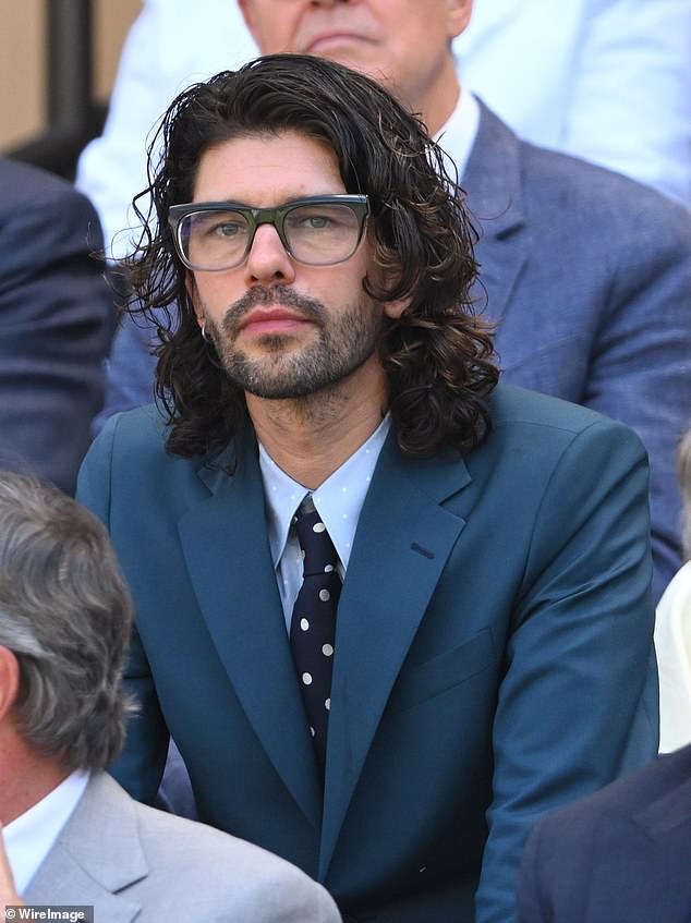Black Doves actor Ben Whishaw looked tennis during the match