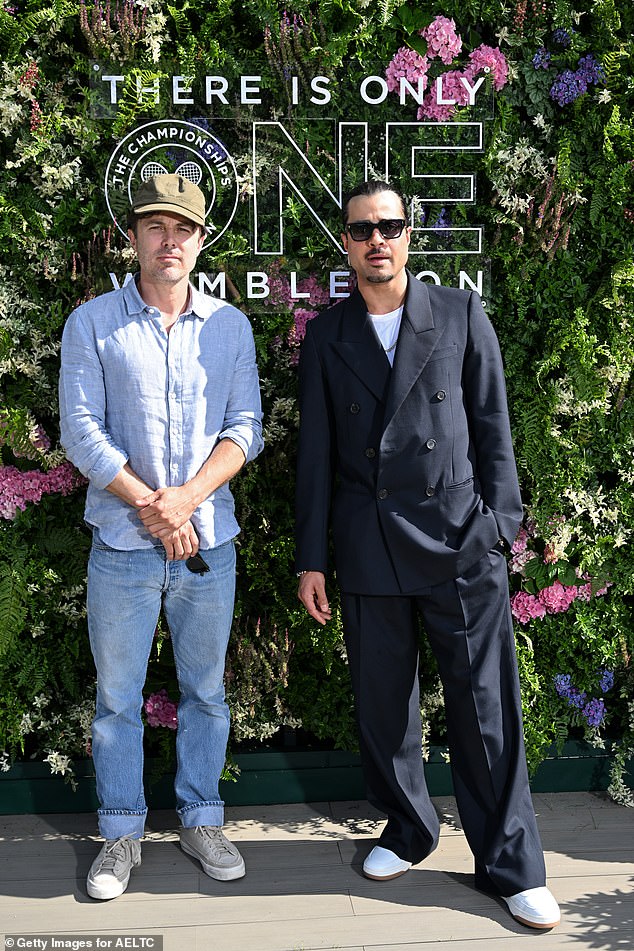 Casey Affleck opted for double denim while Andrei Gillott wore an oversized suit