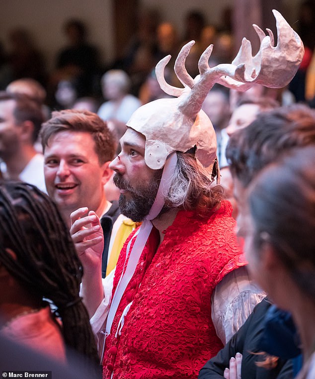 A face in the crowd: Falstaff (George Fouracres) mixes with the 'groundlings' at the Globe
