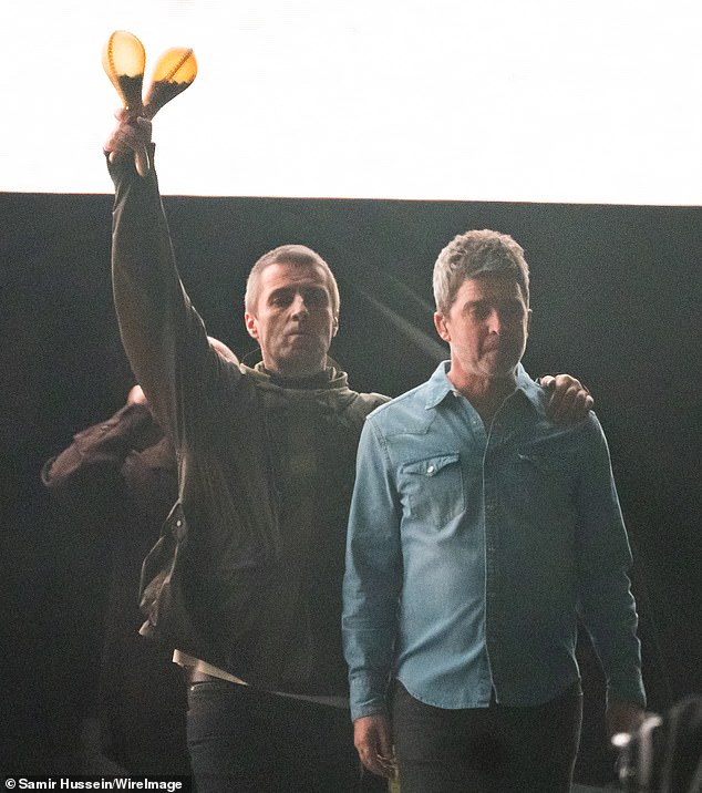 The Oasis stars, who famously split in 2009, were met by a roar from the 75,000 fans who had turned out to see them reunite