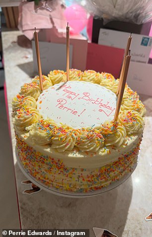 The rainbow theme continued with a sprinkle-covered cake with had the words 'Happy Birthday Perrie' iced onto the top of the cake