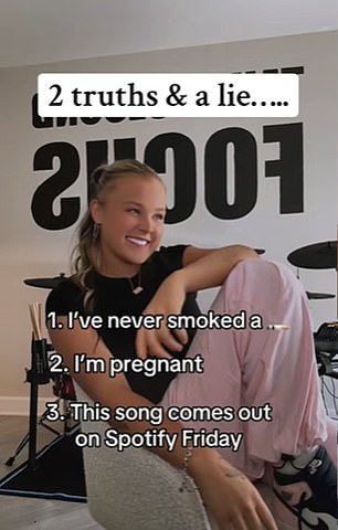JoJo played the game: '2 truths & a lie.....' as her new cover of the 1981 hit track Bette Davis Eyes played in the background and said '1. I've never smoked a [cigarette] 2. I'm pregnant 3. This song comes out on Spotify Friday'