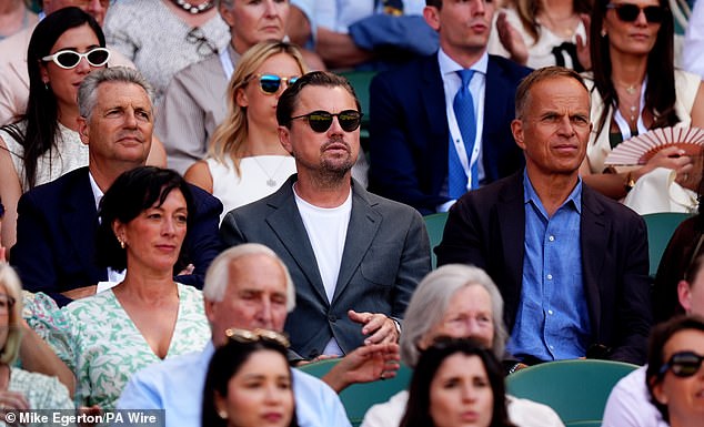 The Hollywood star opted for a simple grey blazer jacket and white T-shirt as he watched the Taylor Fritz and Carlos Alcaraz match