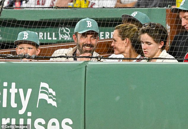 The actor could be seen sitting next to Garner, 53, and two of their children: Fin, 16, and Samuel, 13, at Fenway Park. Their eldest child Violet, 19, was notably absent from the game